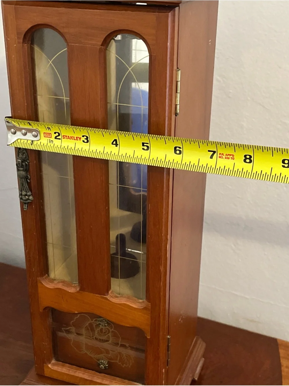 Vintage Tall Wooden Jewelry Armoire with Glass Front and Rose Detail